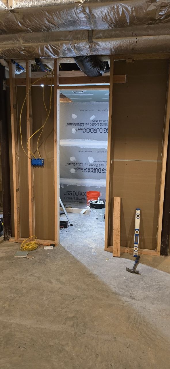 Basement framing with bathroom rough-in — J&R Enterprise project